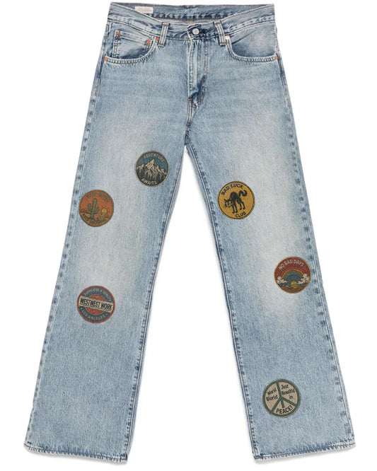 VINTAGE PRINT SELVEDGE JEAN front view with vintage printed graphics